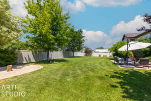 View of yard featuring an outdoor living space and a patio area