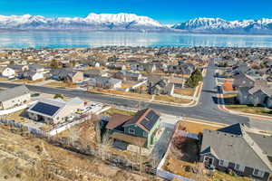 Drone / aerial view with a water and mountain view