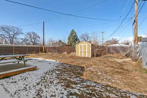 View of yard featuring a storage shed