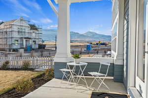 View of side patio / terrace with a mountain view