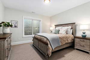 View of carpeted bedroom