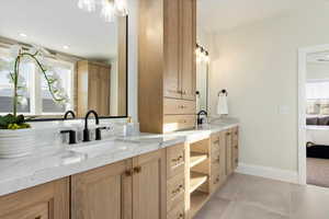 Primary Bathroom with double vanity and extra storage