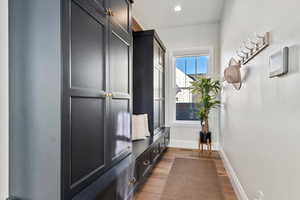 Mudroom featuring hardwood / wood-style floors