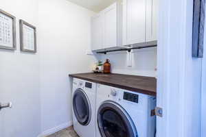 Laundry room with cabinets