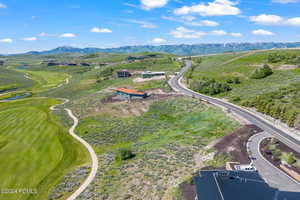 Drone / aerial view featuring a mountain view