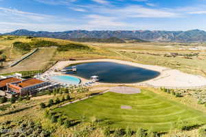 View of pool with a mountain view