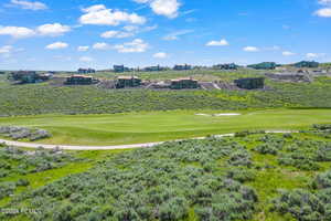 View of community featuring a yard