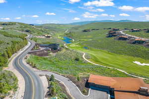 Bird's eye view with a water and mountain view