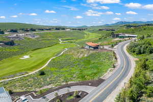 Birds eye view of property with a mountain view