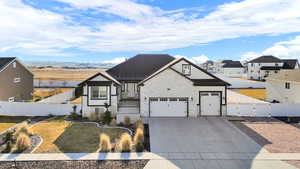 View of front of property with a garage