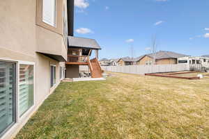 View of yard with a patio