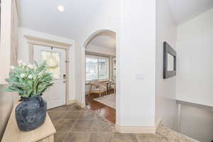 Entrance foyer with lofted ceiling