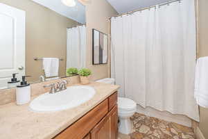 Bathroom with vanity and toilet