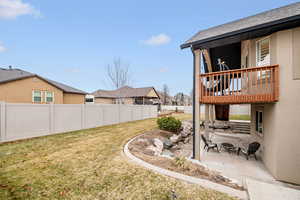 View of yard with a fire pit, a patio area, and a deck