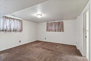 Interior space featuring a textured ceiling