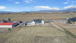 Birds eye view of property featuring a rural view and a mountain view