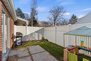 View of yard with a patio area