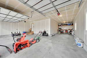 Garage featuring a garage door opener