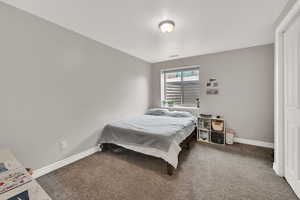 View of carpeted bedroom