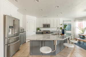 Kitchen with Bosch appliances & granite counter tops