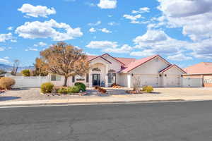 View of front facade featuring a 3 car garage.