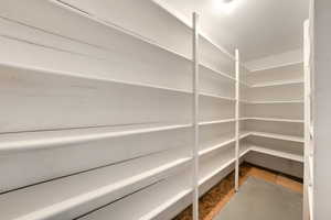 View of pantry  Ducted for heat and a/c.  Access from inside garage.