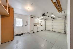 Third car garage with cupboards