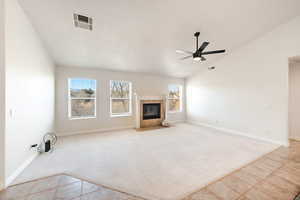 Family room with fireplace and mountain view.