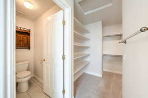 Primary bathroom and walk in closet.