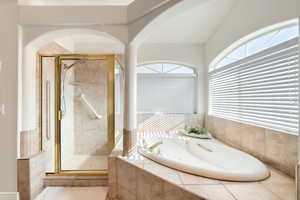 Primary Bathroom with shower and jetted tub.