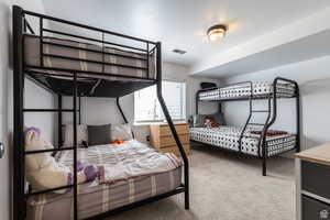 View of carpeted bedroom