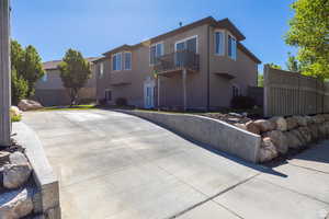 View of front of home with a balcony