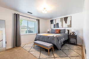 View of carpeted bedroom