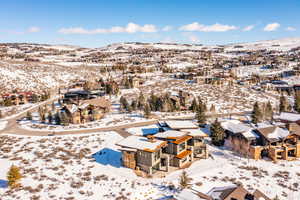 Snowy aerial view with a mountain view