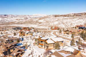 Snowy aerial view with a mountain view