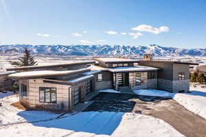 View of front of house featuring a mountain view