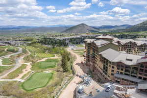 Drone / aerial view featuring a mountain view