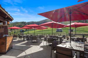 View of  restaurant patio featuring a mountain view