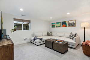 Living room with light colored carpet