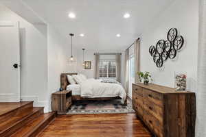 Bedroom featuring hardwood / wood-style floors