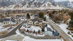 Snowy aerial view with a mountain view