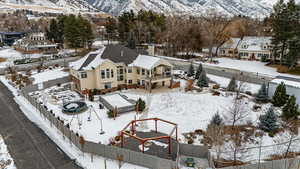 Snowy aerial view with a mountain view