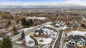 Snowy aerial view with a mountain view