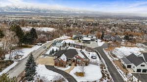 Snowy aerial view with a mountain view