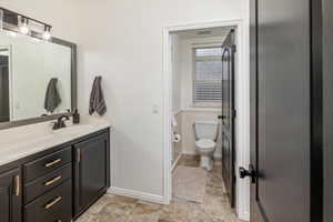 Bathroom with vanity and toilet