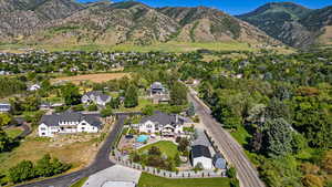 Birds eye view of property with a mountain view