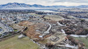 Birds eye view of property with a mountain view