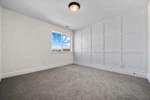 Unfurnished room featuring carpet floors