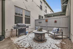 View of patio / terrace featuring a grill and an outdoor fire pit