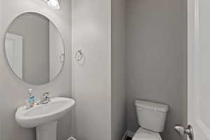 Bathroom with sink and toilet